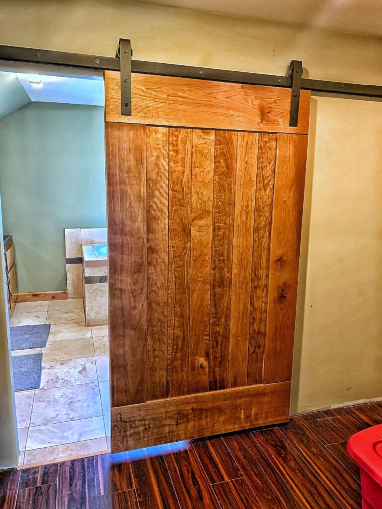 Redpoint Woodworks Revamping a Client’s Master Suite With a Wild Cherry Custom Barn Door